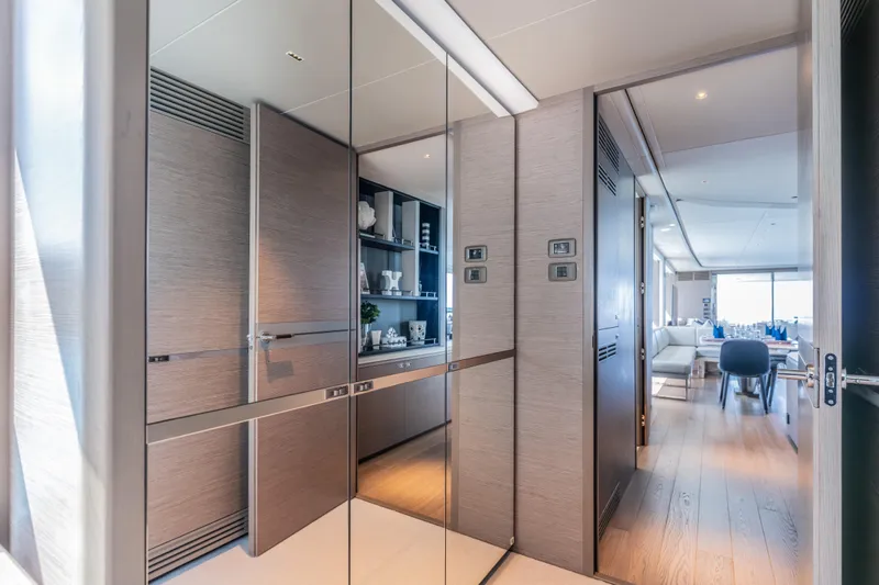 Gemini Yacht Photos Pics Luxurious interior of 2023 Princess X95 yacht, featuring modern design and elegant furnishings.