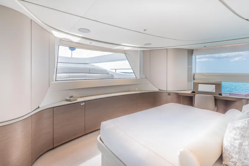 Gemini Yacht Photos Pics Luxurious interior of 2023 Princess X95 yacht with ocean view and modern furnishings.