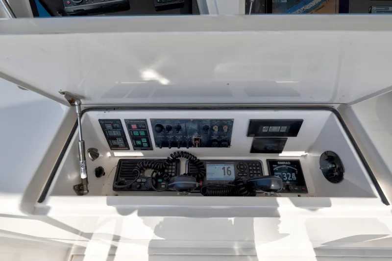  Yacht Photos Pics 2008 Viking Convertible boat control panel with communication and navigation equipment.