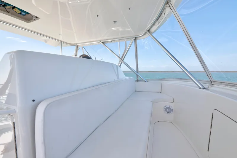  Yacht Photos Pics 2008 Viking Convertible boat interior with white seating and ocean view.