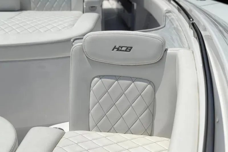  Yacht Photos Pics Luxurious seating on 2025 HCB 48 Campeon boat with diamond stitching.