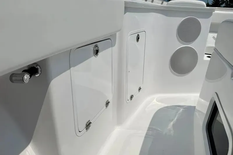  Yacht Photos Pics 2025 HCB 48 Campeon boat interior with storage compartments and sleek design.