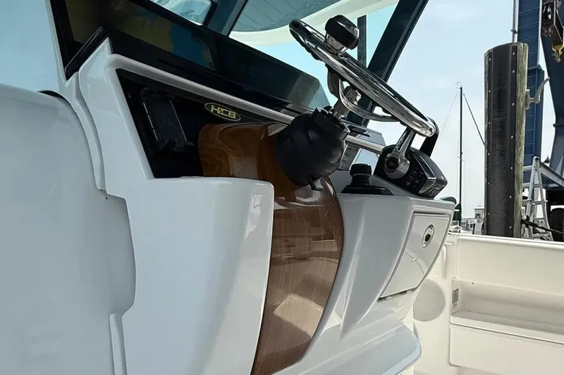  Yacht Photos Pics Helm of 2025 HCB 48 Campeon boat with sleek design and modern controls.