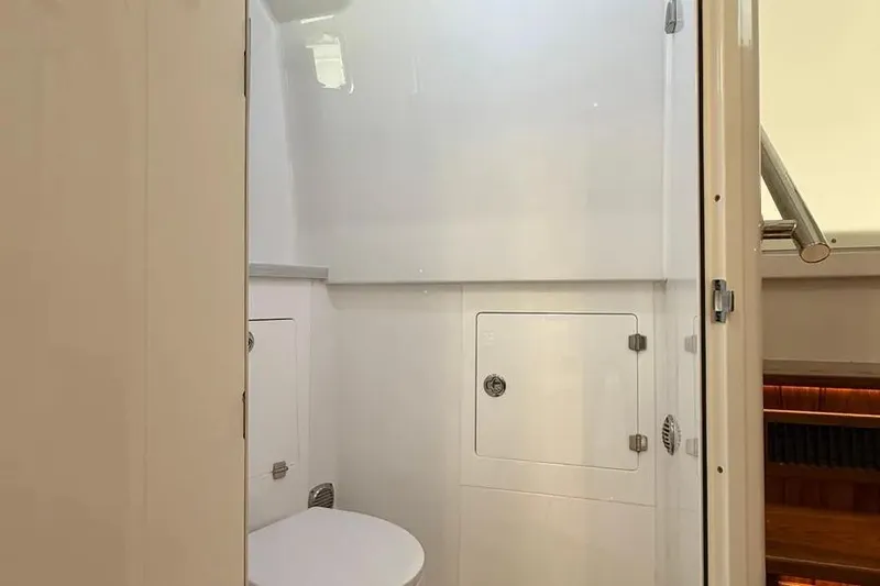  Yacht Photos Pics 2025 HCB 48 Campeon yacht bathroom interior with modern fixtures and white cabinetry.