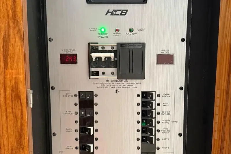  Yacht Photos Pics Electrical control panel on 2025 HCB 48 Campeon boat, showing shore power and circuit breakers.