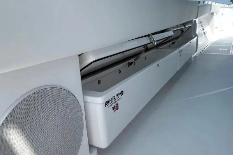  Yacht Photos Pics 2025 HCB 48 Campeon boat interior with Frigid Rigid cooler and speaker.