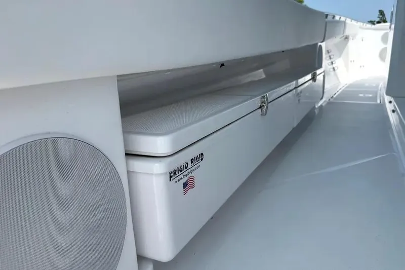  Yacht Photos Pics 2025 HCB 48 Campeon boat interior with storage compartment and speaker.