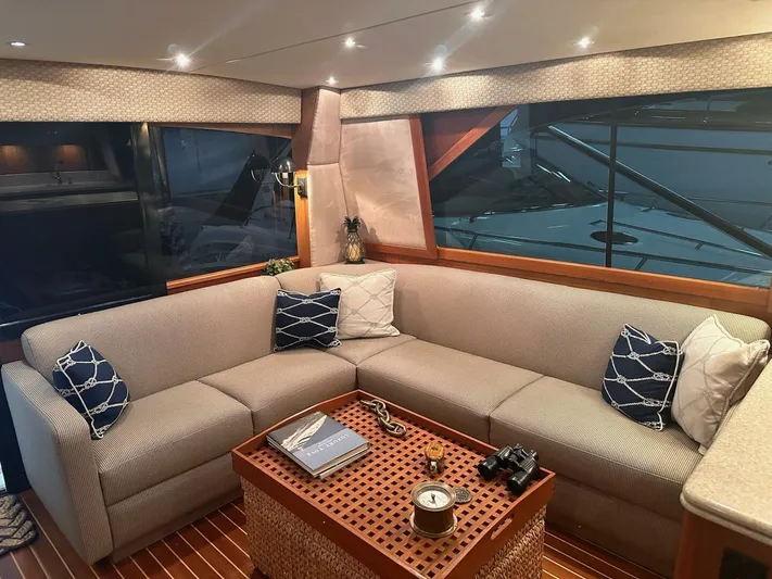 Gran Vida Yacht Photos Pics Luxurious 1998 Ocean Yachts Super Sport interior with elegant seating and nautical decor.