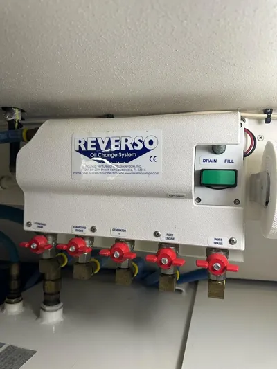 Gran Vida Yacht Photos Pics Reverso oil change system on 1998 Ocean Yachts Super Sport, featuring multiple valves and controls.