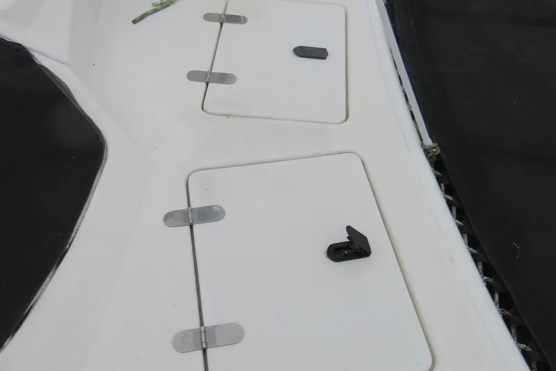 Pippin Yacht Photos Pics Deck hatches on a 2001 Catana 471 catamaran, featuring secure latches and hinges.
