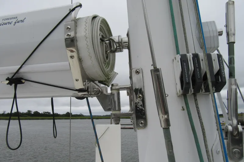 Pippin Yacht Photos Pics Catana 471 sailboat rigging and furling system, 2001 model, on a calm water backdrop.