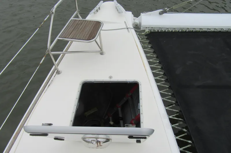 Pippin Yacht Photos Pics Catana 471 catamaran deck with open hatch and seating, 2001 model.