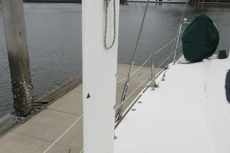 Pippin Yacht Photos Pics Catana 471 sailboat docked, showcasing deck and mast, 2001 model.