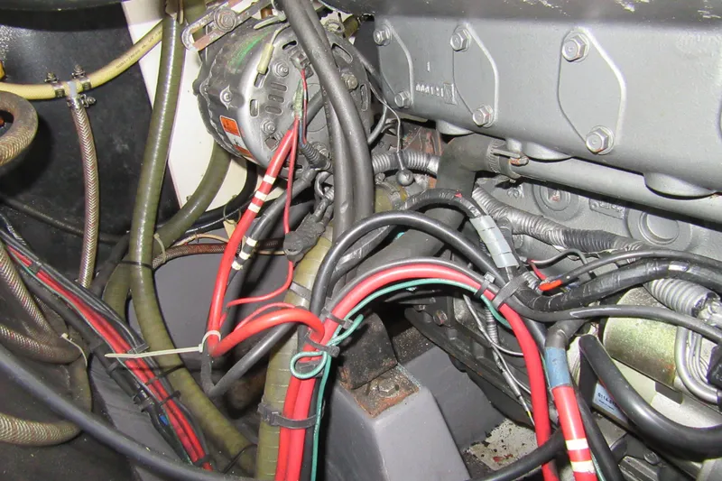 Pippin Yacht Photos Pics Engine compartment of a 2001 Catana 471 with visible wiring and components.