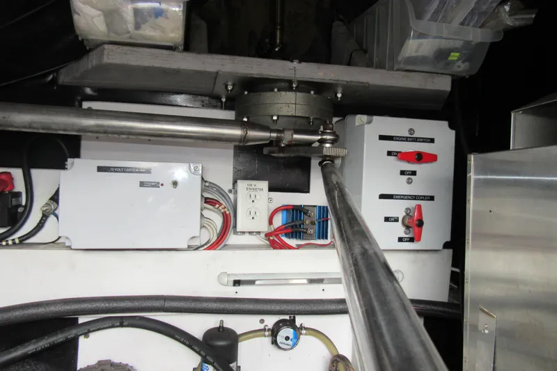 Pippin Yacht Photos Pics Engine room of a 2001 Catana 471 catamaran, featuring electrical panels and wiring.