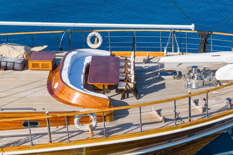 Take It Easier Yacht Photos Pics Luxurious 2007 Custom Gulet Motorsailer deck with elegant seating and dining area.