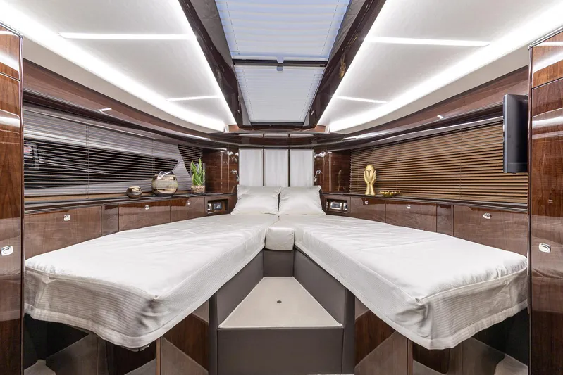  Yacht Photos Pics Luxurious interior of 2024 Galeon 400 Fly yacht with elegant wood finishes and modern lighting.