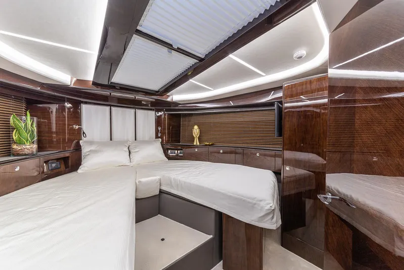  Yacht Photos Pics Luxurious interior of 2024 Galeon 400 Fly yacht with elegant wood finishes.