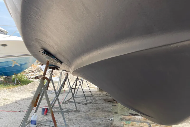 Sudden Comfort Yacht Photos Pics 2001 Carver 444 Cockpit Motor Yacht hull on stands, undergoing maintenance.