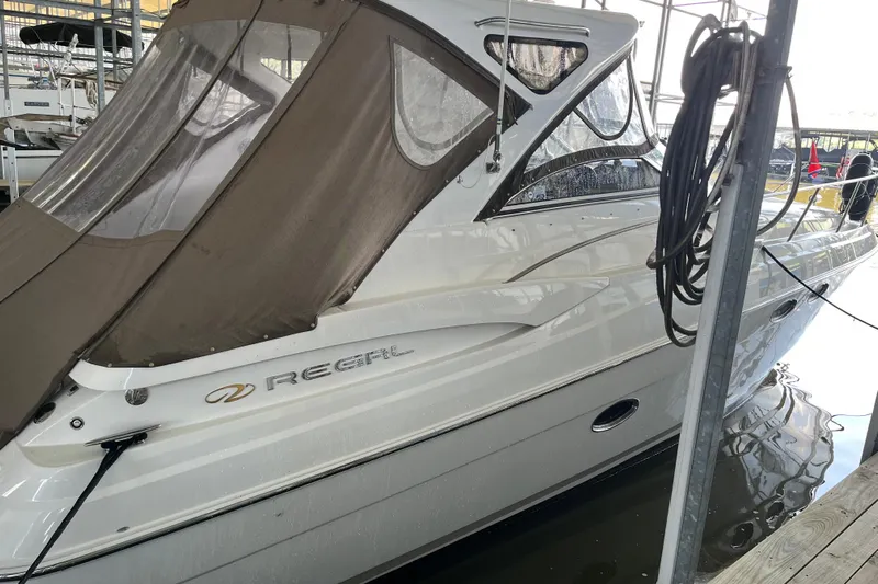 River Dancer Yacht Photos Pics 2007 Regal 3760 IB Commodore yacht docked with protective cover.