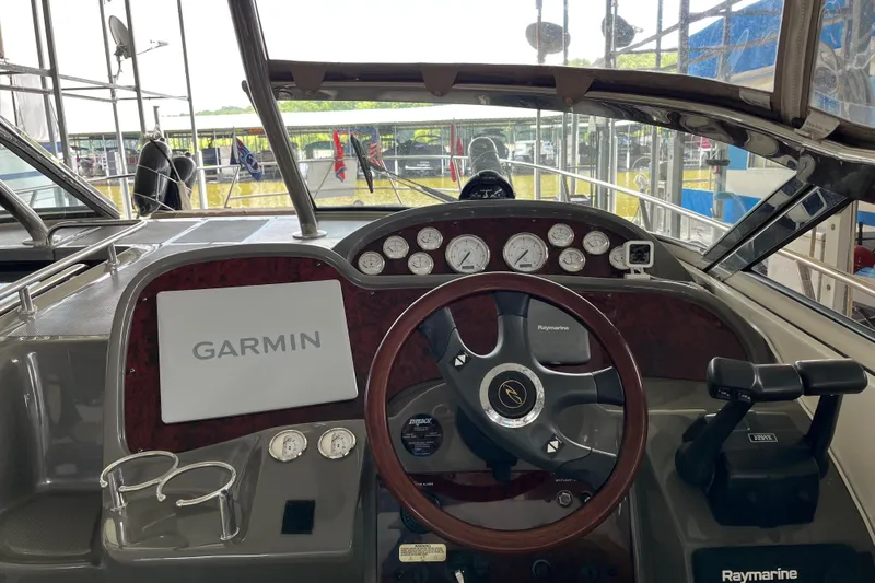 River Dancer Yacht Photos Pics 2007 Regal 3760 IB Commodore boat dashboard with Garmin and Raymarine equipment.