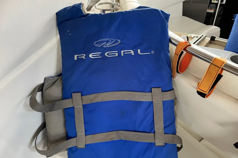 River Dancer Yacht Photos Pics Blue Regal life jacket on a 2007 Regal 3760 IB Commodore boat.