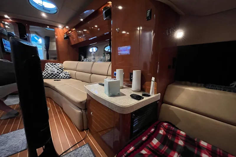 River Dancer Yacht Photos Pics Luxurious interior of 2007 Regal 3760 IB Commodore yacht with plush seating and modern amenities.