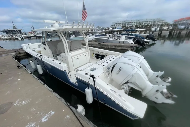 Equanimity Yacht Photos Pics 2021 Pursuit S 328 Sport boat docked at marina with twin Yamaha engines.
