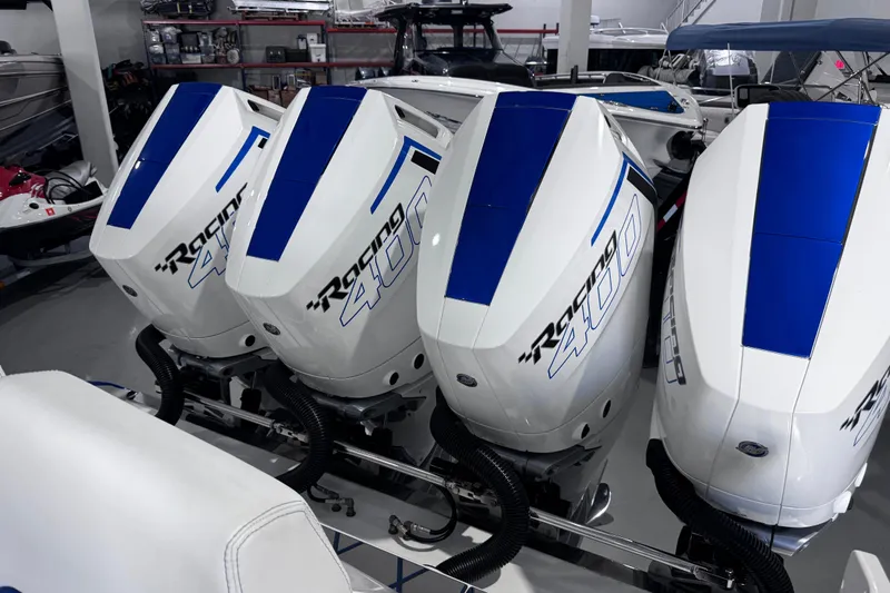 Yacht Photos Pics Four powerful outboard motors on a 2024 Deep Impact 399 Sport boat.