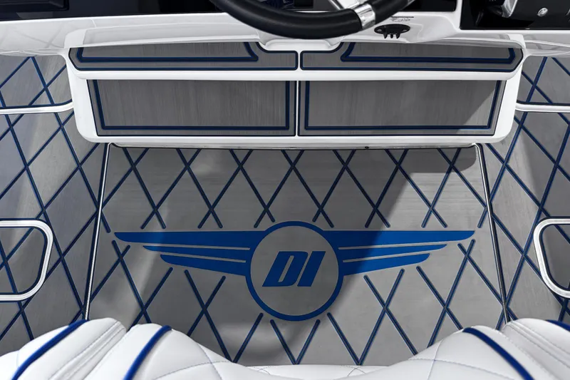  Yacht Photos Pics 2024 Deep Impact 399 Sport boat interior with blue diamond pattern flooring and logo.