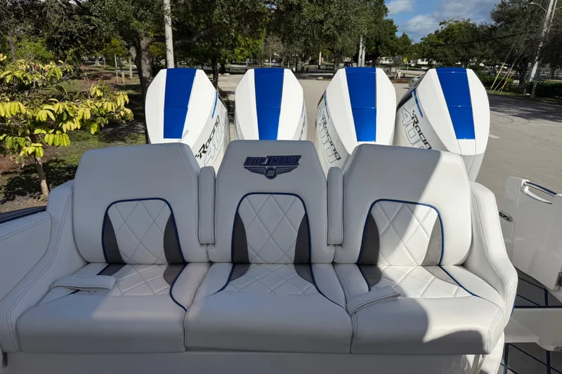  Yacht Photos Pics 2024 Deep Impact 399 Sport boat with luxurious seating and powerful engines.