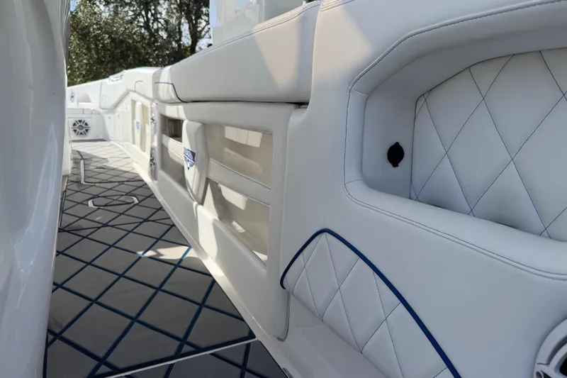  Yacht Photos Pics Luxurious interior of 2024 Deep Impact 399 Sport boat with quilted seating and modern design.