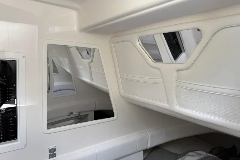  Yacht Photos Pics Interior of 2024 Deep Impact 399 Sport boat with sleek white design and modern features.