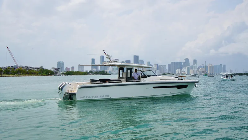 In-stock 2024 Nimbus T11 #258 Yacht Photos Pics 2024 Nimbus Tender 11 #258 cruising in a city harbor.