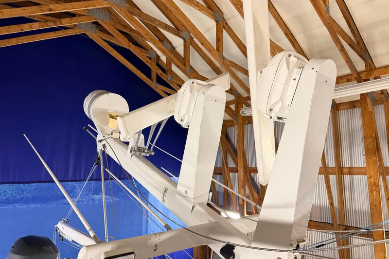 Ocean Osprey Yacht Photos Pics Radar and satellite equipment on a 2006 Selene 57 yacht in a wooden boathouse.