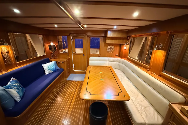 Ocean Osprey Yacht Photos Pics Luxurious 2006 Selene 57 yacht interior with elegant wood finishes and comfortable seating.