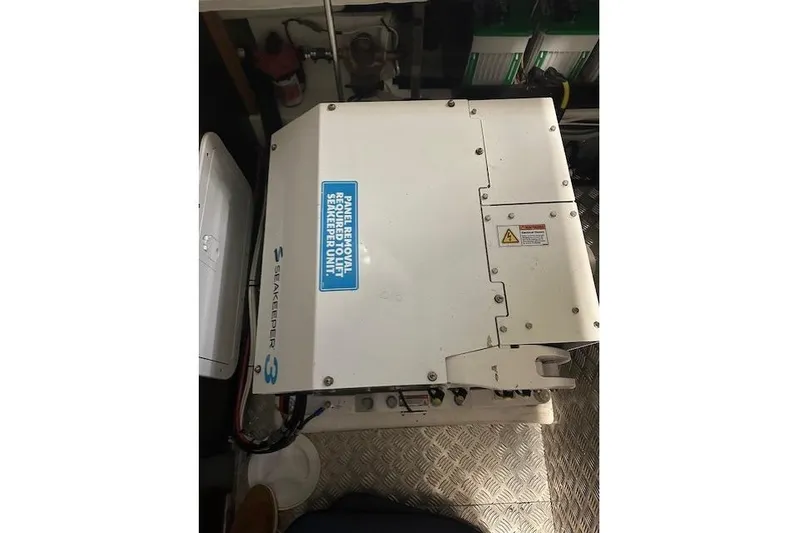  Yacht Photos Pics Engine compartment of a 2023 Nimbus C11 featuring a Seakeeper 3 stabilizer unit.