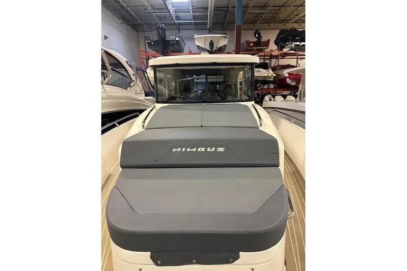  Yacht Photos Pics 2023 Nimbus C11 boat in showroom, featuring sleek design and modern aesthetics.