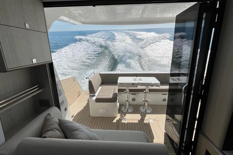  Yacht Photos Pics Luxurious 2026 Galeon 400 Fly yacht interior with ocean view and elegant seating area.