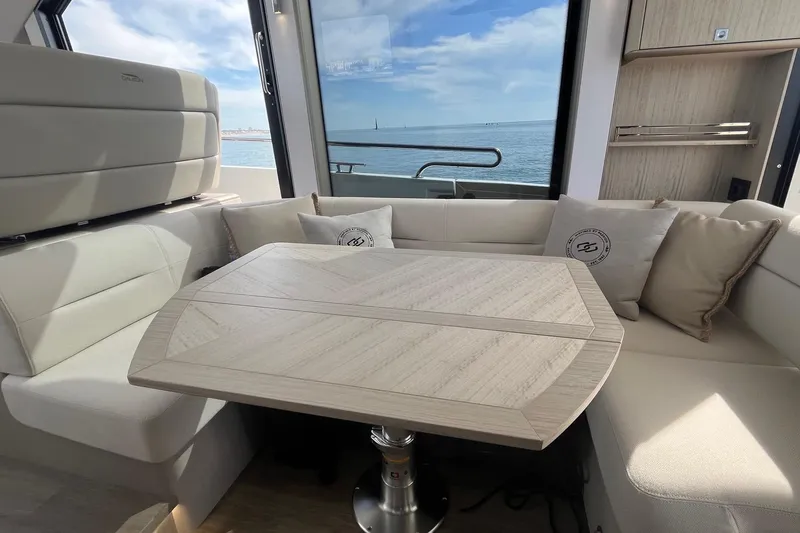  Yacht Photos Pics Luxurious interior of 2026 Galeon 400 Fly yacht with elegant seating and table.