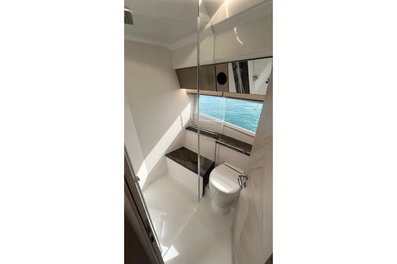  Yacht Photos Pics Luxurious bathroom in 2026 Galeon 400 Fly yacht with modern fixtures and ocean view.