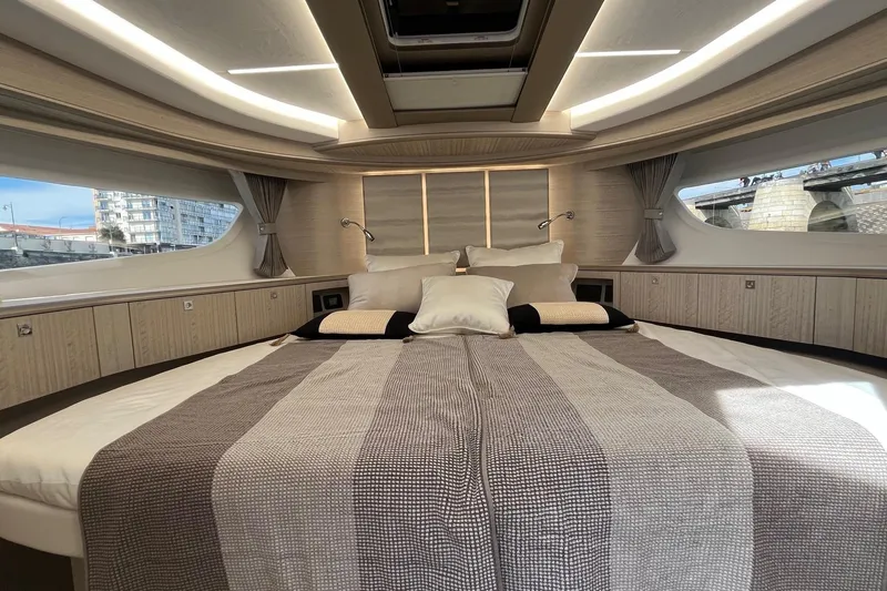  Yacht Photos Pics Luxurious interior of 2026 Galeon 400 Fly yacht with elegant bedding and modern design.