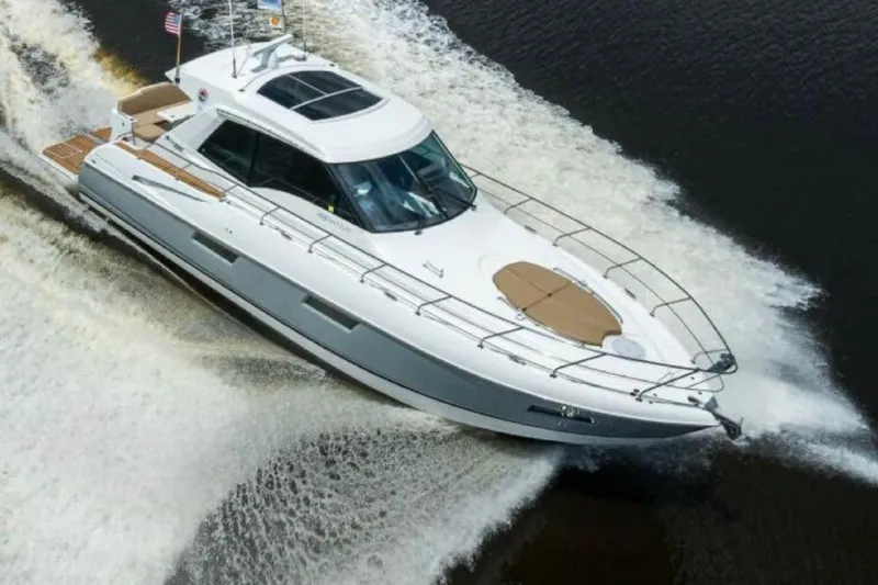 Yacht Photos Pics 2015 Cruisers Cantius yacht cruising on water, creating a dynamic wake.
