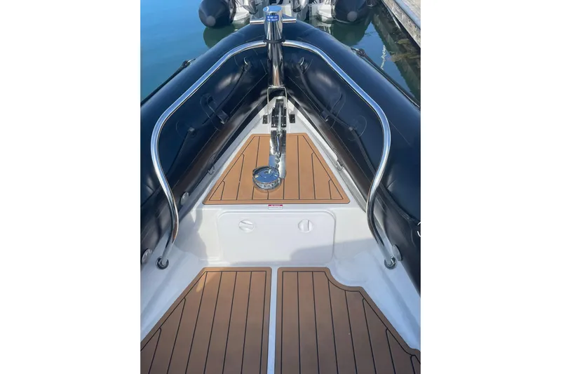 Yacht Photos Pics 2024 Protector 330 Targa boat deck with sleek design and twin 400 HP engines.