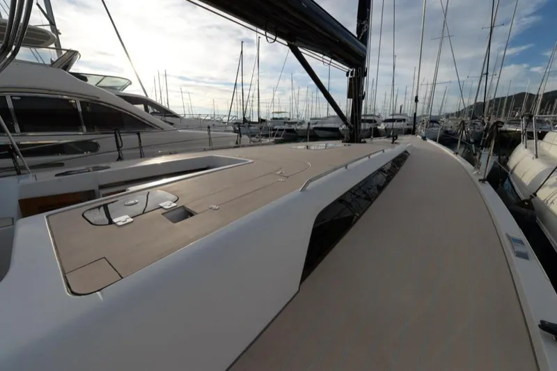  Yacht Photos Pics 2019 Solaris 50 yacht deck view in marina, surrounded by other boats.