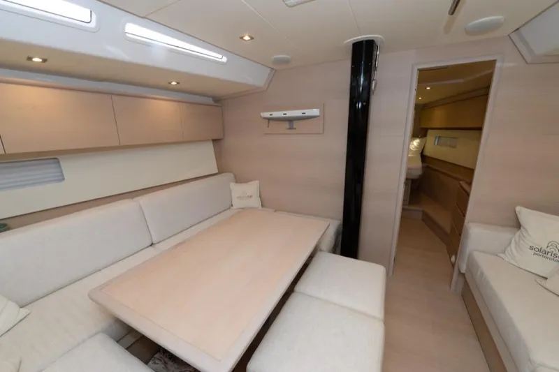  Yacht Photos Pics Luxurious interior of a 2019 Solaris 50 yacht with elegant seating and modern design.