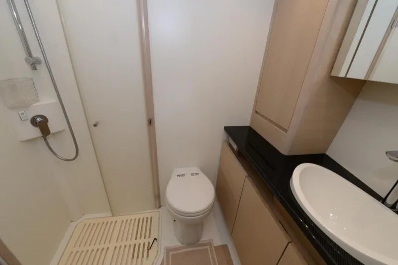  Yacht Photos Pics Modern bathroom in 2019 Solaris 50 yacht with shower, toilet, and sink.