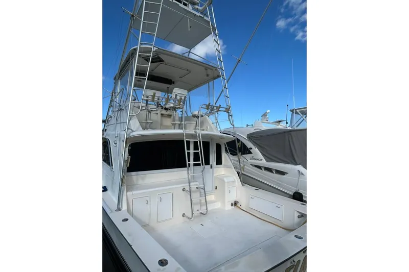 Nelmar Yacht Photos Pics 1988 Ocean Yachts 48 Super Sport boat with tower and spacious deck.