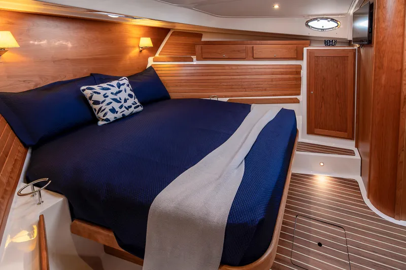 Ready For Customization Yacht Photos Pics Luxurious cabin interior of 2027 Back Cove 412 yacht with elegant wood finish.