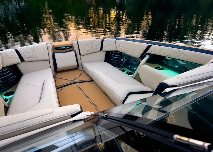  Yacht Photos Pics Luxurious interior of 2026 Nautique Paragon G25 boat with elegant seating and ambient lighting.
